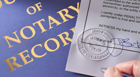 Photo of a document being notarized